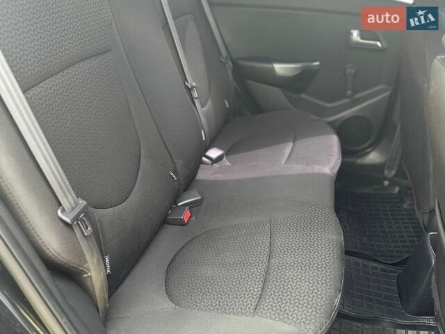 Черный Киа Рио, объемом двигателя 1.4 л и пробегом 108 тыс. км за 7950 $, фото 19 на Automoto.ua