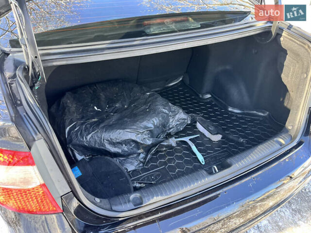 Чорний Кіа Ріо, об'ємом двигуна 1.4 л та пробігом 245 тис. км за 7600 $, фото 28 на Automoto.ua