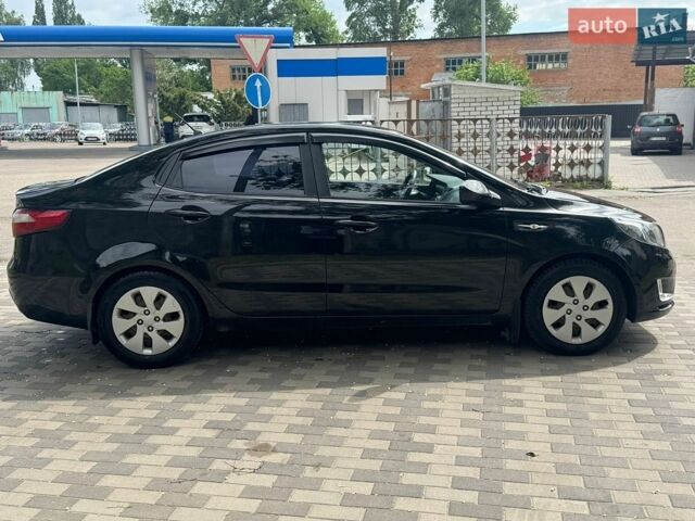 Черный Киа Рио, объемом двигателя 1.4 л и пробегом 155 тыс. км за 7500 $, фото 7 на Automoto.ua