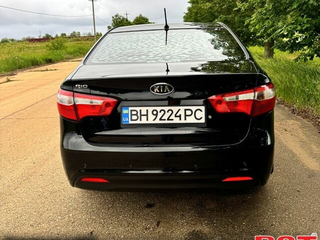 Черный Киа Рио, объемом двигателя 1.4 л и пробегом 131 тыс. км за 7500 $, фото 2 на Automoto.ua