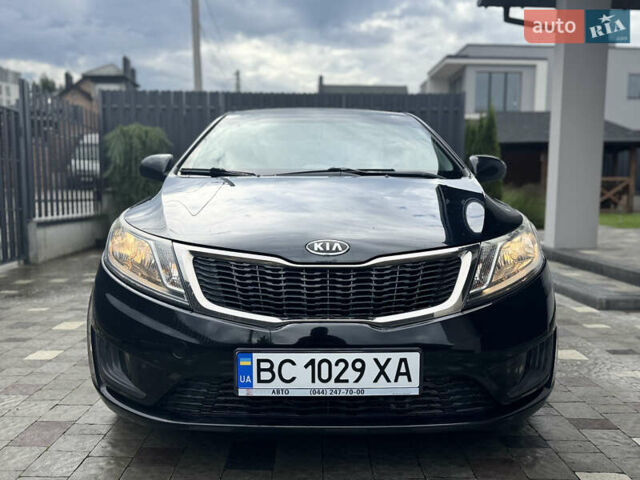Чорний Кіа Ріо, об'ємом двигуна 1.4 л та пробігом 199 тис. км за 5999 $, фото 12 на Automoto.ua