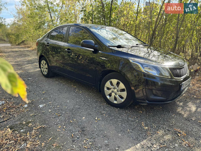 Черный Киа Рио, объемом двигателя 1.4 л и пробегом 173 тыс. км за 7300 $, фото 10 на Automoto.ua