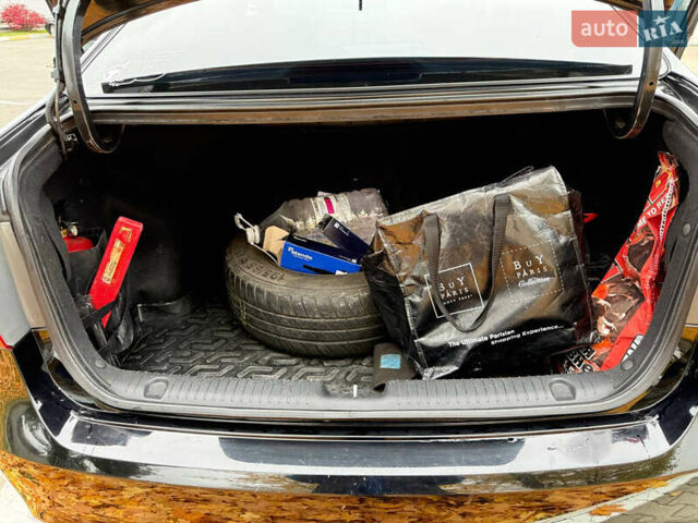 Чорний Кіа Ріо, об'ємом двигуна 1.6 л та пробігом 392 тис. км за 4500 $, фото 6 на Automoto.ua