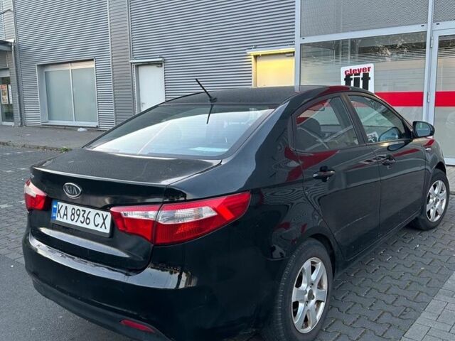 Черный Киа Рио, объемом двигателя 1.4 л и пробегом 190 тыс. км за 6600 $, фото 4 на Automoto.ua