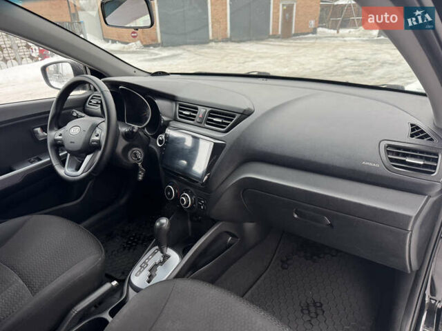 Черный Киа Рио, объемом двигателя 1.4 л и пробегом 155 тыс. км за 7500 $, фото 27 на Automoto.ua