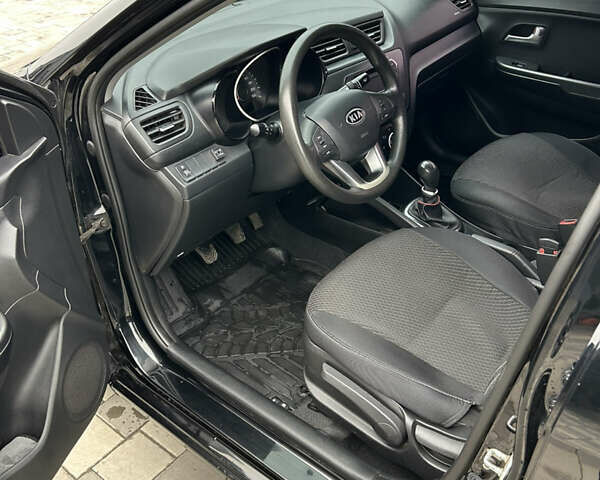 Черный Киа Рио, объемом двигателя 1.4 л и пробегом 111 тыс. км за 7500 $, фото 10 на Automoto.ua