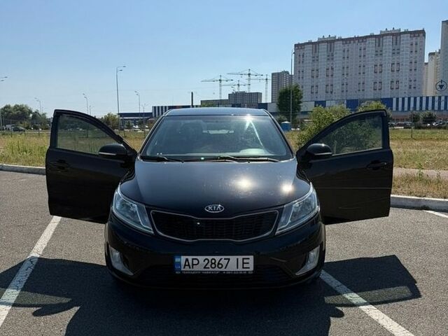 Чорний Кіа Ріо, об'ємом двигуна 1.59 л та пробігом 230 тис. км за 7000 $, фото 4 на Automoto.ua