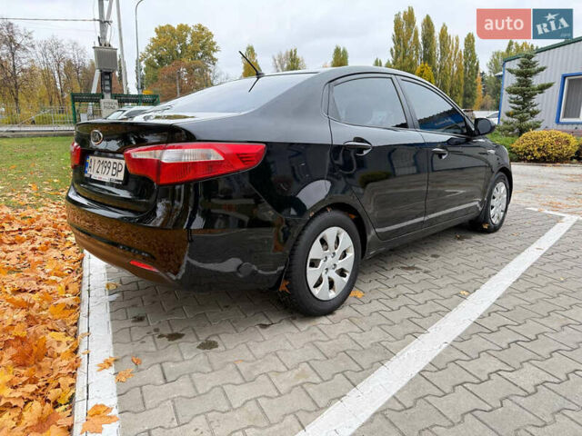 Чорний Кіа Ріо, об'ємом двигуна 1.6 л та пробігом 392 тис. км за 4500 $, фото 17 на Automoto.ua