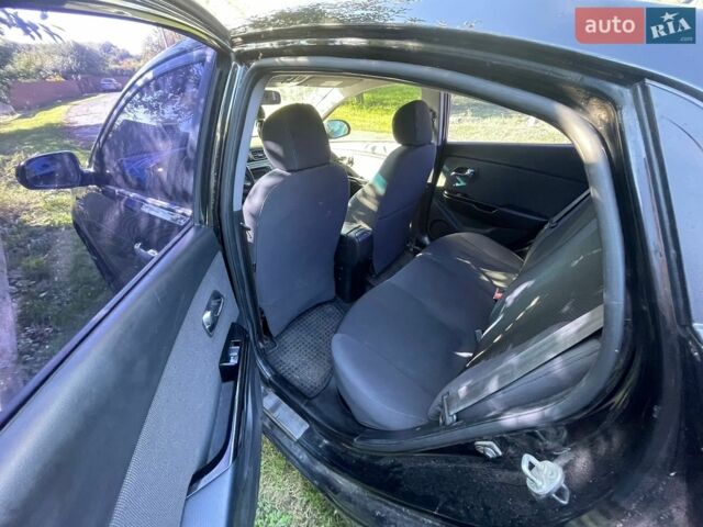 Чорний Кіа Ріо, об'ємом двигуна 1.59 л та пробігом 274 тис. км за 7500 $, фото 5 на Automoto.ua