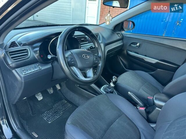Чорний Кіа Ріо, об'ємом двигуна 1.59 л та пробігом 197 тис. км за 5888 $, фото 21 на Automoto.ua