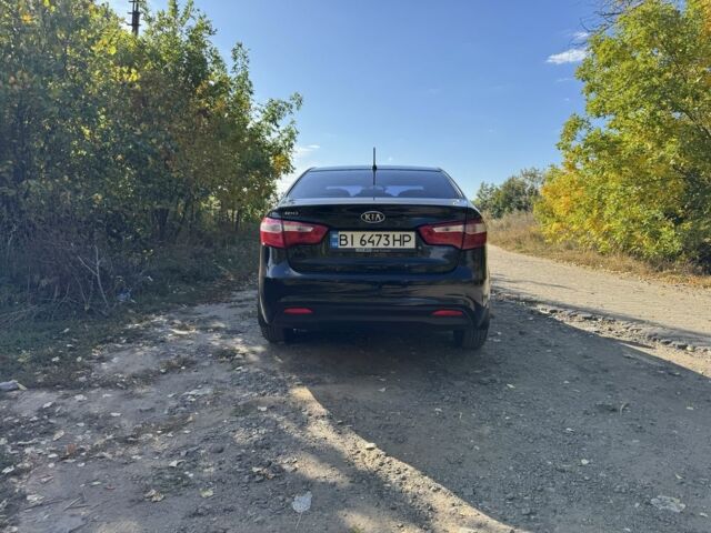 Чорний Кіа Ріо, об'ємом двигуна 1.4 л та пробігом 173 тис. км за 7300 $, фото 6 на Automoto.ua