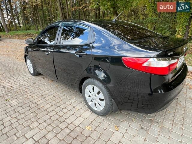 Черный Киа Рио, объемом двигателя 1.59 л и пробегом 160 тыс. км за 8100 $, фото 2 на Automoto.ua