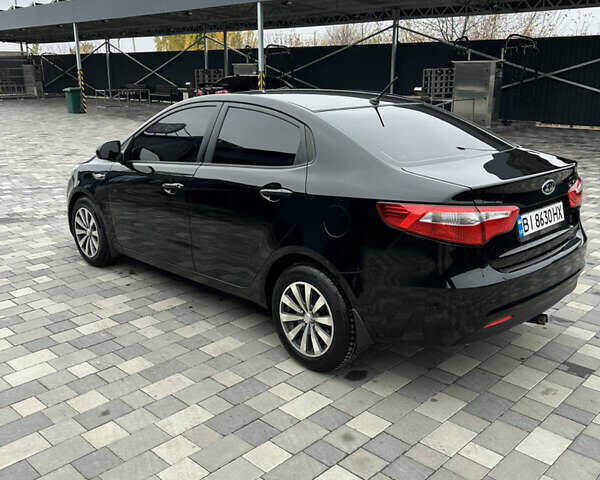 Черный Киа Рио, объемом двигателя 1.4 л и пробегом 111 тыс. км за 7500 $, фото 2 на Automoto.ua