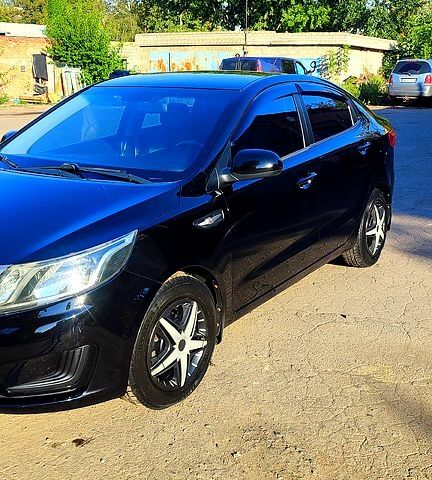 Черный Киа Рио, объемом двигателя 1.4 л и пробегом 120 тыс. км за 7700 $, фото 6 на Automoto.ua