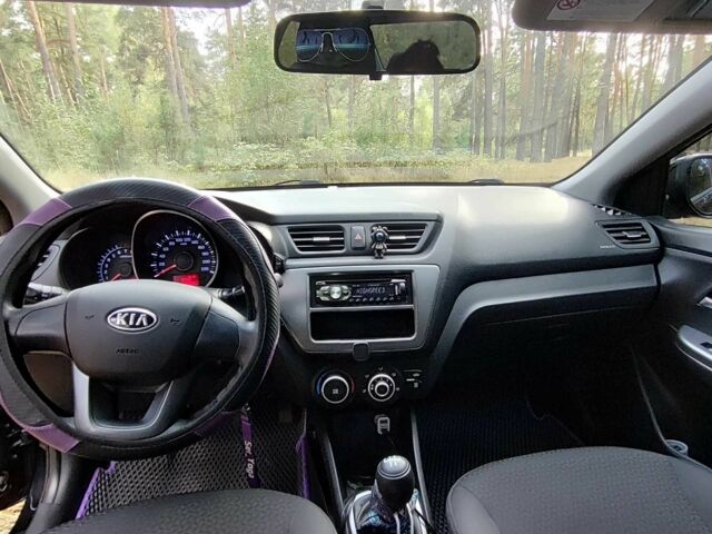 Чорний Кіа Ріо, об'ємом двигуна 0 л та пробігом 125 тис. км за 7099 $, фото 3 на Automoto.ua