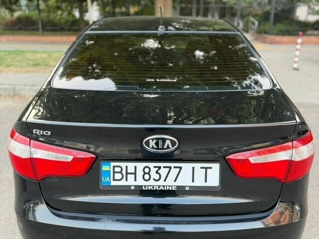 Чорний Кіа Ріо, об'ємом двигуна 1.6 л та пробігом 104 тис. км за 8500 $, фото 3 на Automoto.ua
