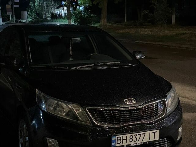 Чорний Кіа Ріо, об'ємом двигуна 1.6 л та пробігом 104 тис. км за 8500 $, фото 18 на Automoto.ua