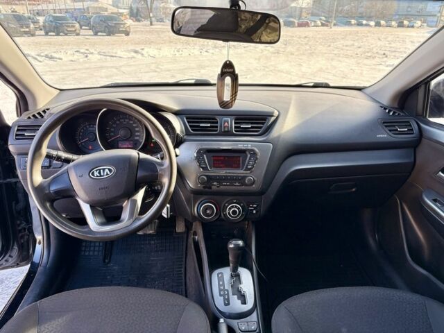 Чорний Кіа Ріо, об'ємом двигуна 1.6 л та пробігом 270 тис. км за 6499 $, фото 10 на Automoto.ua