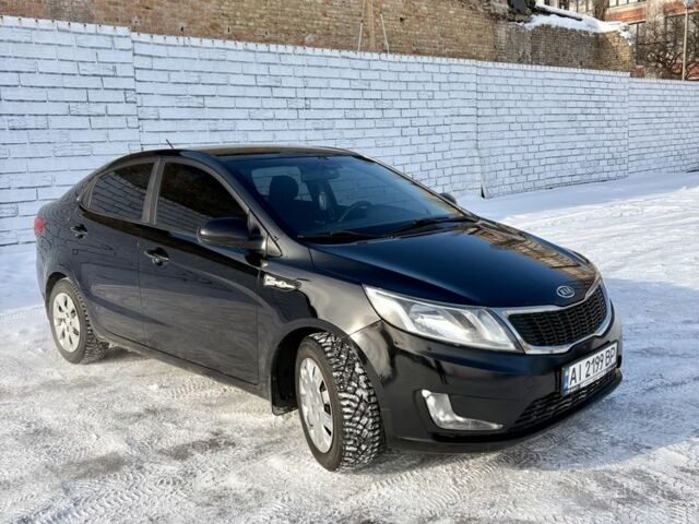 Чорний Кіа Ріо, об'ємом двигуна 1.6 л та пробігом 270 тис. км за 6499 $, фото 4 на Automoto.ua