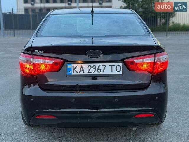 Чорний Кіа Ріо, об'ємом двигуна 1.4 л та пробігом 201 тис. км за 6950 $, фото 3 на Automoto.ua