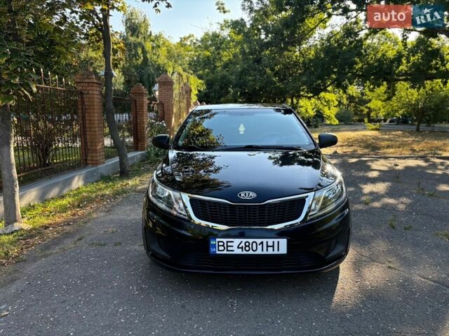 Чорний Кіа Ріо, об'ємом двигуна 1.4 л та пробігом 165 тис. км за 7900 $, фото 2 на Automoto.ua