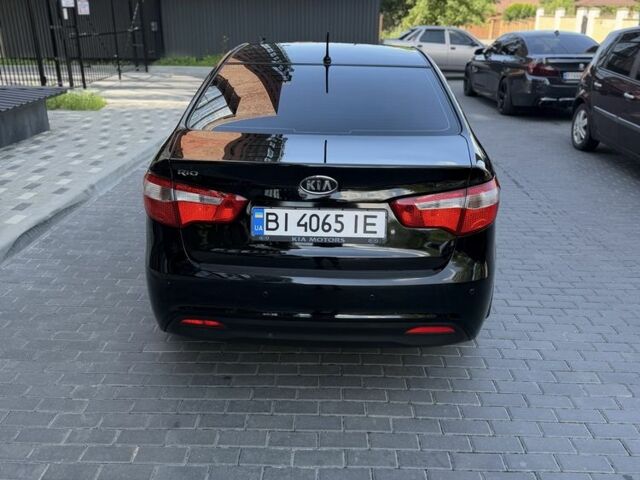 Чорний Кіа Ріо, об'ємом двигуна 1.4 л та пробігом 103 тис. км за 7999 $, фото 4 на Automoto.ua