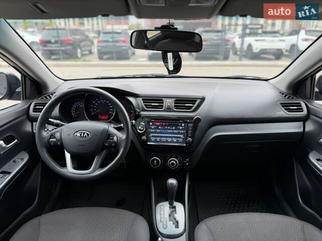 Чорний Кіа Ріо, об'ємом двигуна 1.4 л та пробігом 202 тис. км за 6900 $, фото 8 на Automoto.ua