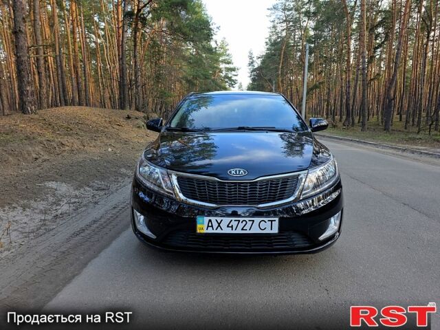 Черный Киа Рио, объемом двигателя 1.6 л и пробегом 103 тыс. км за 6800 $, фото 1 на Automoto.ua