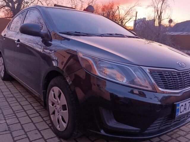 Чорний Кіа Ріо, об'ємом двигуна 1.4 л та пробігом 162 тис. км за 7500 $, фото 5 на Automoto.ua