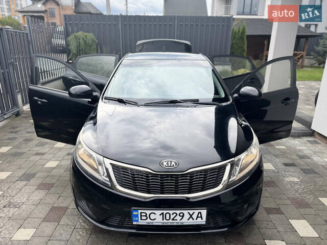 Чорний Кіа Ріо, об'ємом двигуна 1.4 л та пробігом 199 тис. км за 5999 $, фото 22 на Automoto.ua