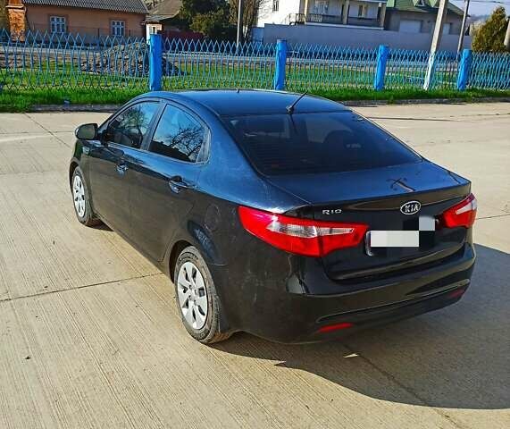 Черный Киа Рио, объемом двигателя 1.4 л и пробегом 125 тыс. км за 6700 $, фото 5 на Automoto.ua