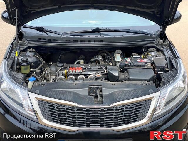 Чорний Кіа Ріо, об'ємом двигуна 1.4 л та пробігом 170 тис. км за 7800 $, фото 8 на Automoto.ua