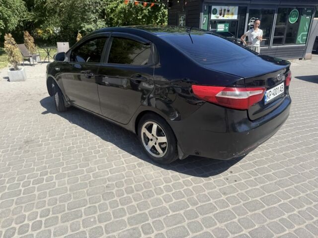 Черный Киа Рио, объемом двигателя 1.6 л и пробегом 330 тыс. км за 5500 $, фото 6 на Automoto.ua