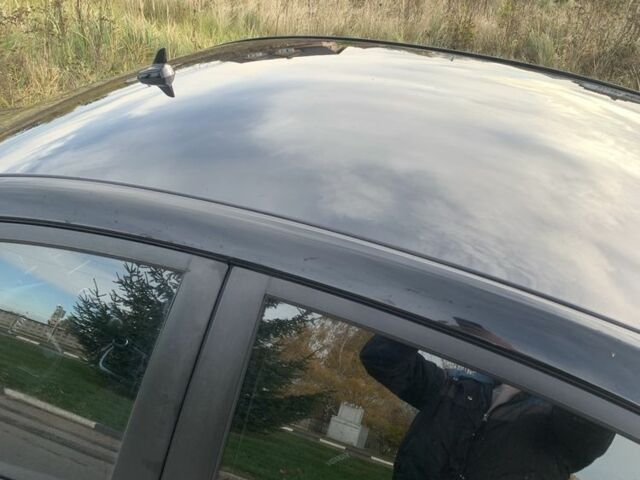 Чорний Кіа Ріо, об'ємом двигуна 1.4 л та пробігом 190 тис. км за 5500 $, фото 9 на Automoto.ua