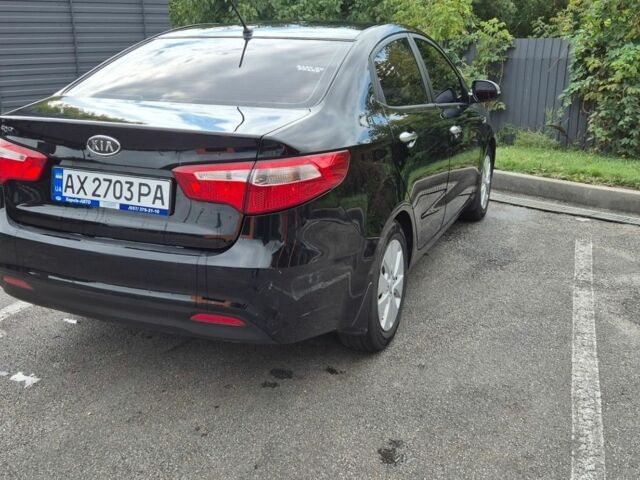Чорний Кіа Ріо, об'ємом двигуна 1.59 л та пробігом 127 тис. км за 8800 $, фото 1 на Automoto.ua
