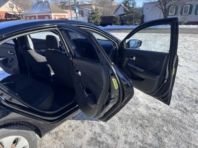 Чорний Кіа Ріо, об'ємом двигуна 1.4 л та пробігом 160 тис. км за 7700 $, фото 4 на Automoto.ua