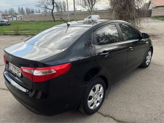 Чорний Кіа Ріо, об'ємом двигуна 1.6 л та пробігом 273 тис. км за 6200 $, фото 4 на Automoto.ua