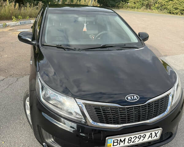 Черный Киа Рио, объемом двигателя 1.4 л и пробегом 74 тыс. км за 8900 $, фото 5 на Automoto.ua