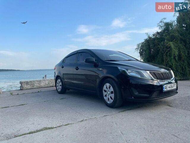 Чорний Кіа Ріо, об'ємом двигуна 1.4 л та пробігом 178 тис. км за 7800 $, фото 2 на Automoto.ua