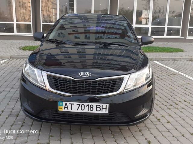 Чорний Кіа Ріо, об'ємом двигуна 1.4 л та пробігом 80 тис. км за 8700 $, фото 1 на Automoto.ua