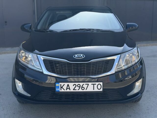 Чорний Кіа Ріо, об'ємом двигуна 1.4 л та пробігом 201 тис. км за 6948 $, фото 7 на Automoto.ua