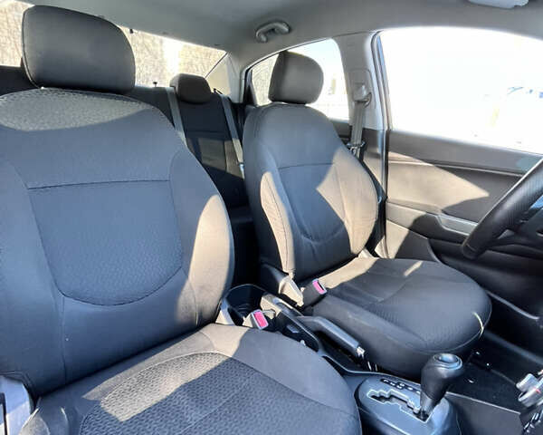 Чорний Кіа Ріо, об'ємом двигуна 1.4 л та пробігом 245 тис. км за 7600 $, фото 24 на Automoto.ua