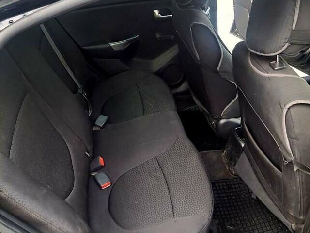 Черный Киа Рио, объемом двигателя 1.4 л и пробегом 197 тыс. км за 7000 $, фото 7 на Automoto.ua