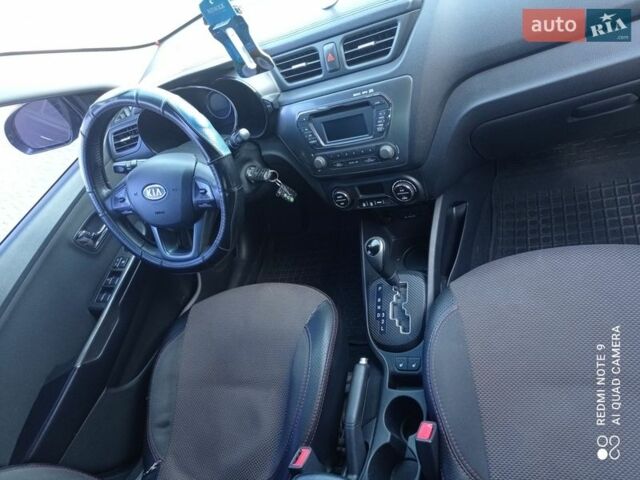 Черный Киа Рио, объемом двигателя 1.6 л и пробегом 285 тыс. км за 7800 $, фото 4 на Automoto.ua