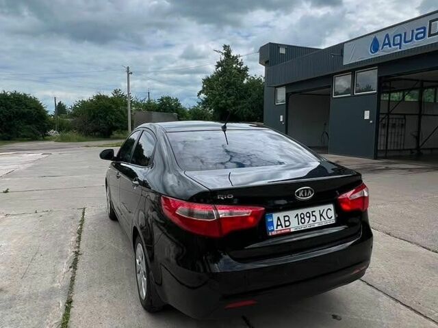 Черный Киа Рио, объемом двигателя 1.4 л и пробегом 199 тыс. км за 8600 $, фото 2 на Automoto.ua