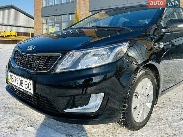 Чорний Кіа Ріо, об'ємом двигуна 1.59 л та пробігом 93 тис. км за 8999 $, фото 4 на Automoto.ua