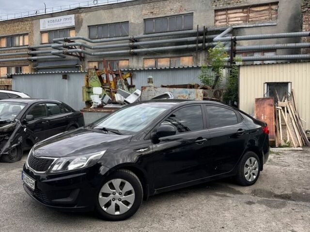 Чорний Кіа Ріо, об'ємом двигуна 1.4 л та пробігом 230 тис. км за 5000 $, фото 2 на Automoto.ua