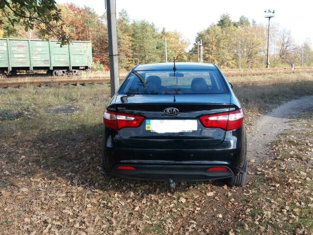 Чорний Кіа Ріо, об'ємом двигуна 1.4 л та пробігом 77 тис. км за 8500 $, фото 1 на Automoto.ua