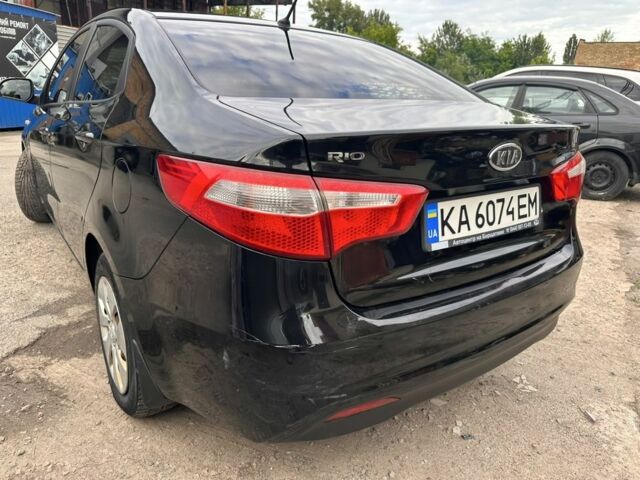 Чорний Кіа Ріо, об'ємом двигуна 1.4 л та пробігом 230 тис. км за 5000 $, фото 4 на Automoto.ua