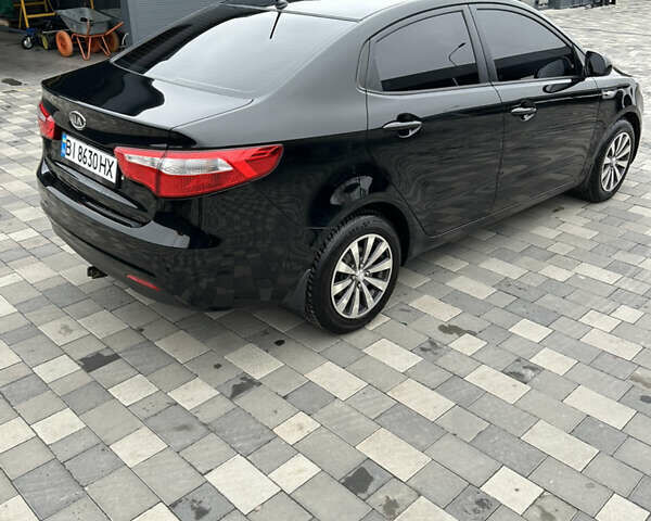 Черный Киа Рио, объемом двигателя 1.4 л и пробегом 111 тыс. км за 7500 $, фото 5 на Automoto.ua
